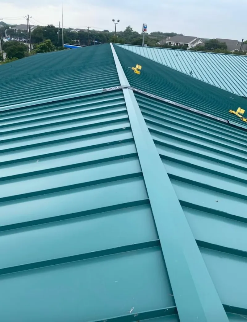 Green commercial metal roof ridge and valley for Metal Roof Repair in Fernley