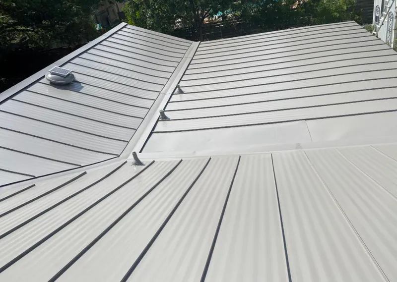 Solar attic fan installed on a metal roof for Roof Ventilation in Fernley